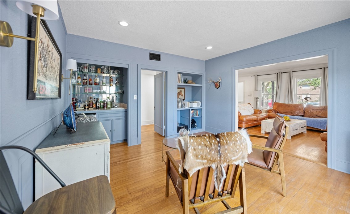 245 Leming Avenue Corpus Christi, TX 78404 - Photo 7 of 33 a living room with furniture and wooden floor