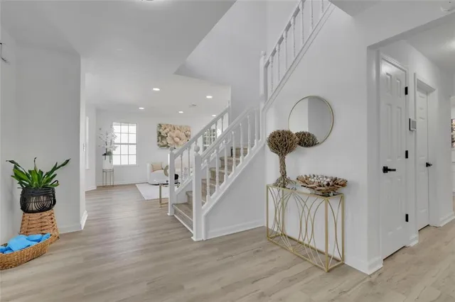 a view of entryway with wooden floor