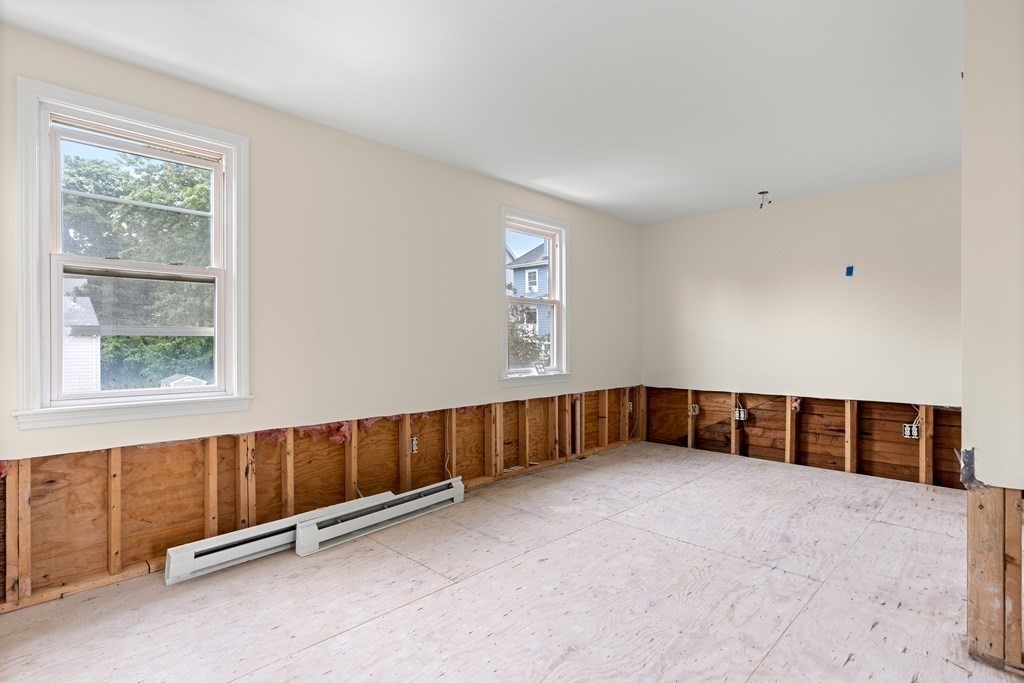 69 Fox Hill Road Nahant, MA 01908 - Photo 12 of 42 an empty room with windows