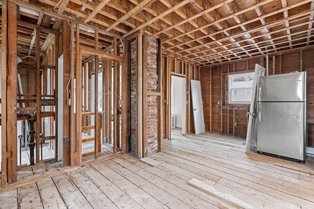 69 Fox Hill Road Nahant, MA 01908 - Photo 23 of 42 a view of a refrigerator with wooden floor