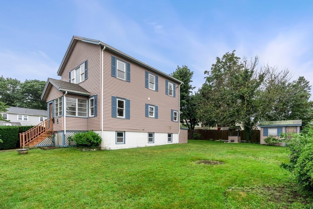 69 Fox Hill Road Nahant, MA 01908 - Photo 29 of 42 a front view of a house with garden