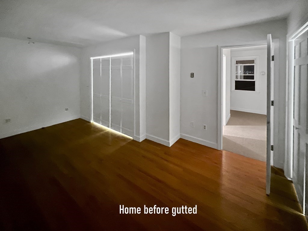 69 Fox Hill Road Nahant, MA 01908 - Photo 32 of 42 a view of empty room with wooden floor