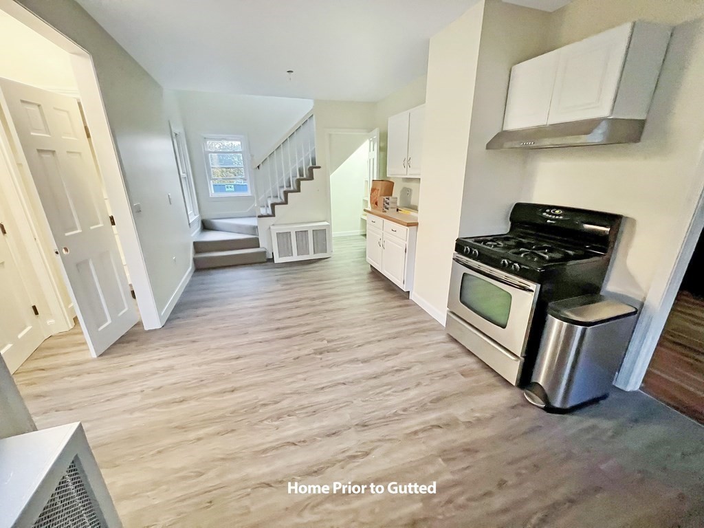 69 Fox Hill Road Nahant, MA 01908 - Photo 33 of 42 a kitchen with wooden floors and appliances