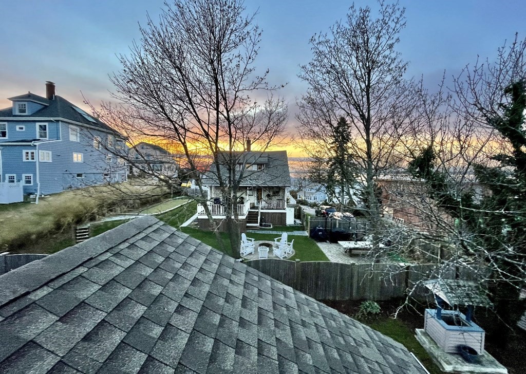 69 Fox Hill Road Nahant, MA 01908 - Photo 40 of 42 a front view of a house with a yard
