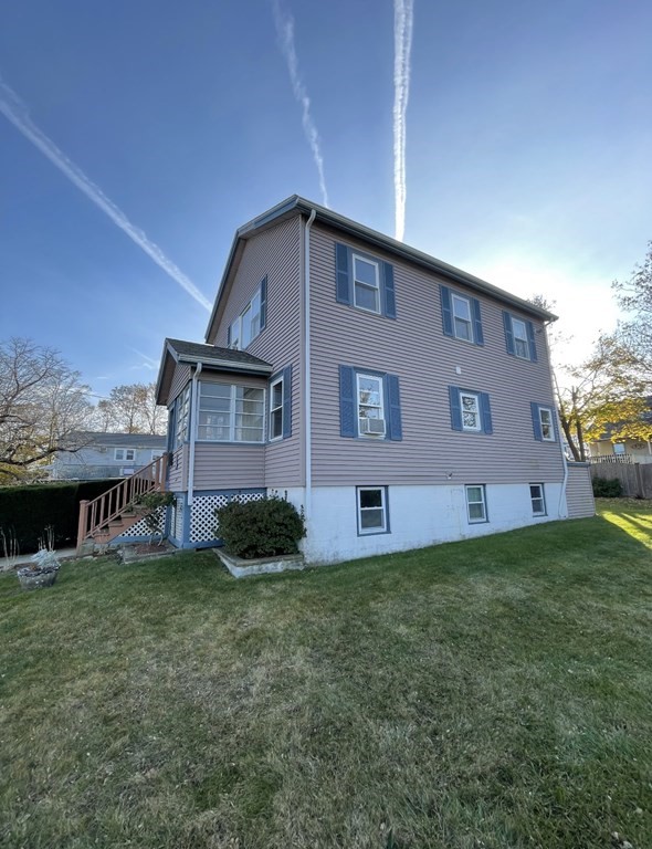 69 Fox Hill Road Nahant, MA 01908 - Photo 42 of 42 a view of a house with a yard