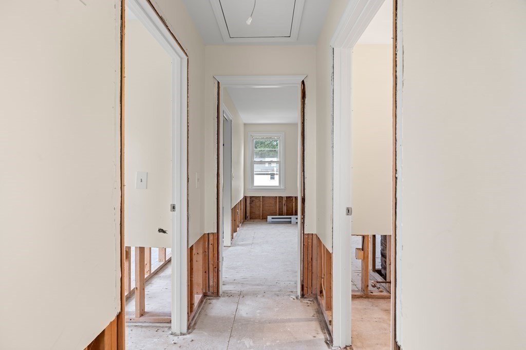 69 Fox Hill Road Nahant, MA 01908 - Photo 7 of 42 a view of a livingroom and a hallway