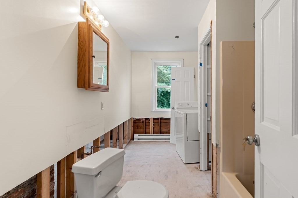 69 Fox Hill Road Nahant, MA 01908 - Photo 8 of 42 a living room with furniture and a window