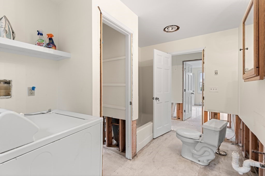 69 Fox Hill Road Nahant, MA 01908 - Photo 9 of 42 a utility room with dryer and washer