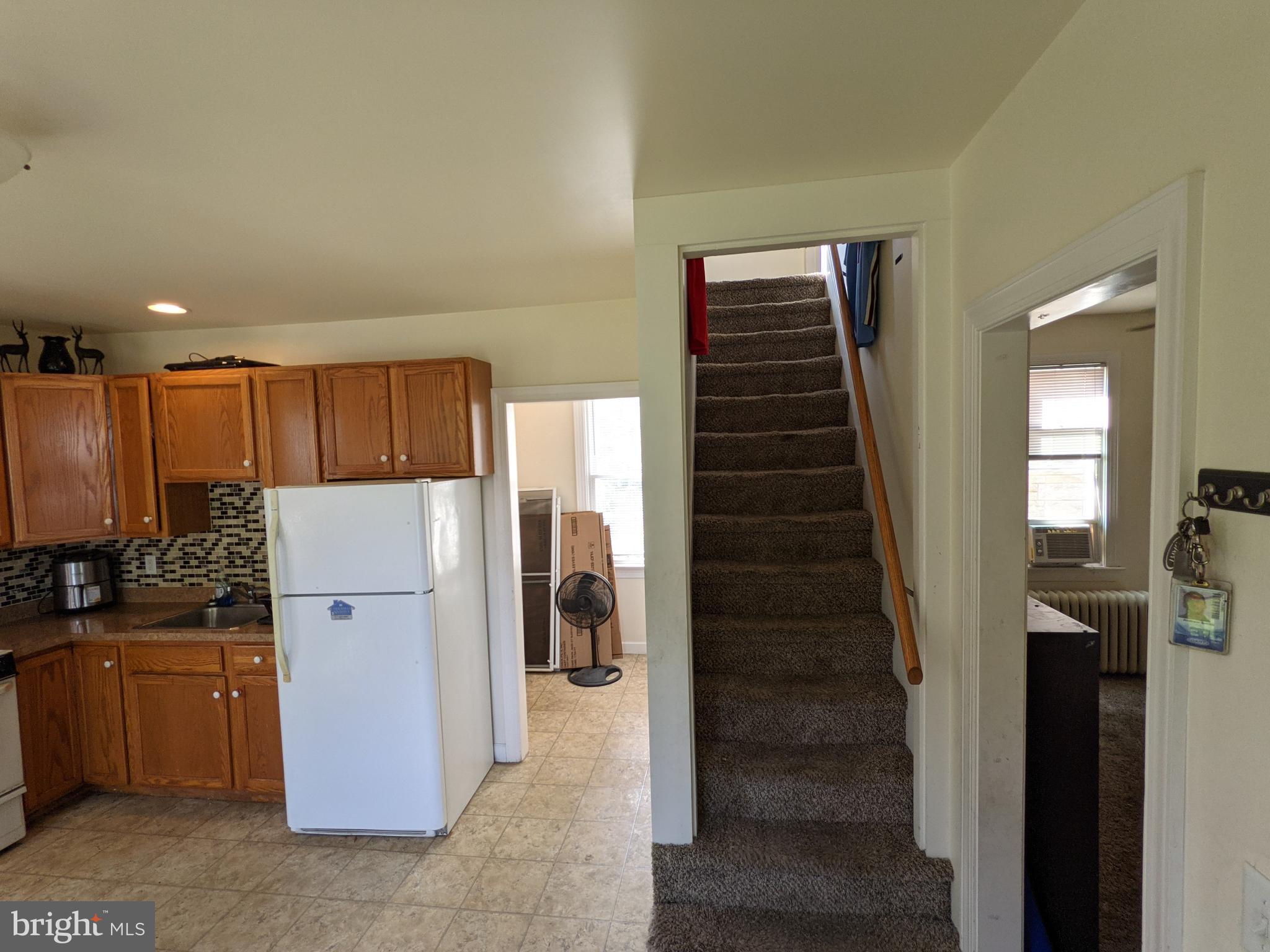 442 South Main Street, Unit A Manheim, PA 17545 - Photo 12 of 26 a view of a kitchen with refrigerator and microwave