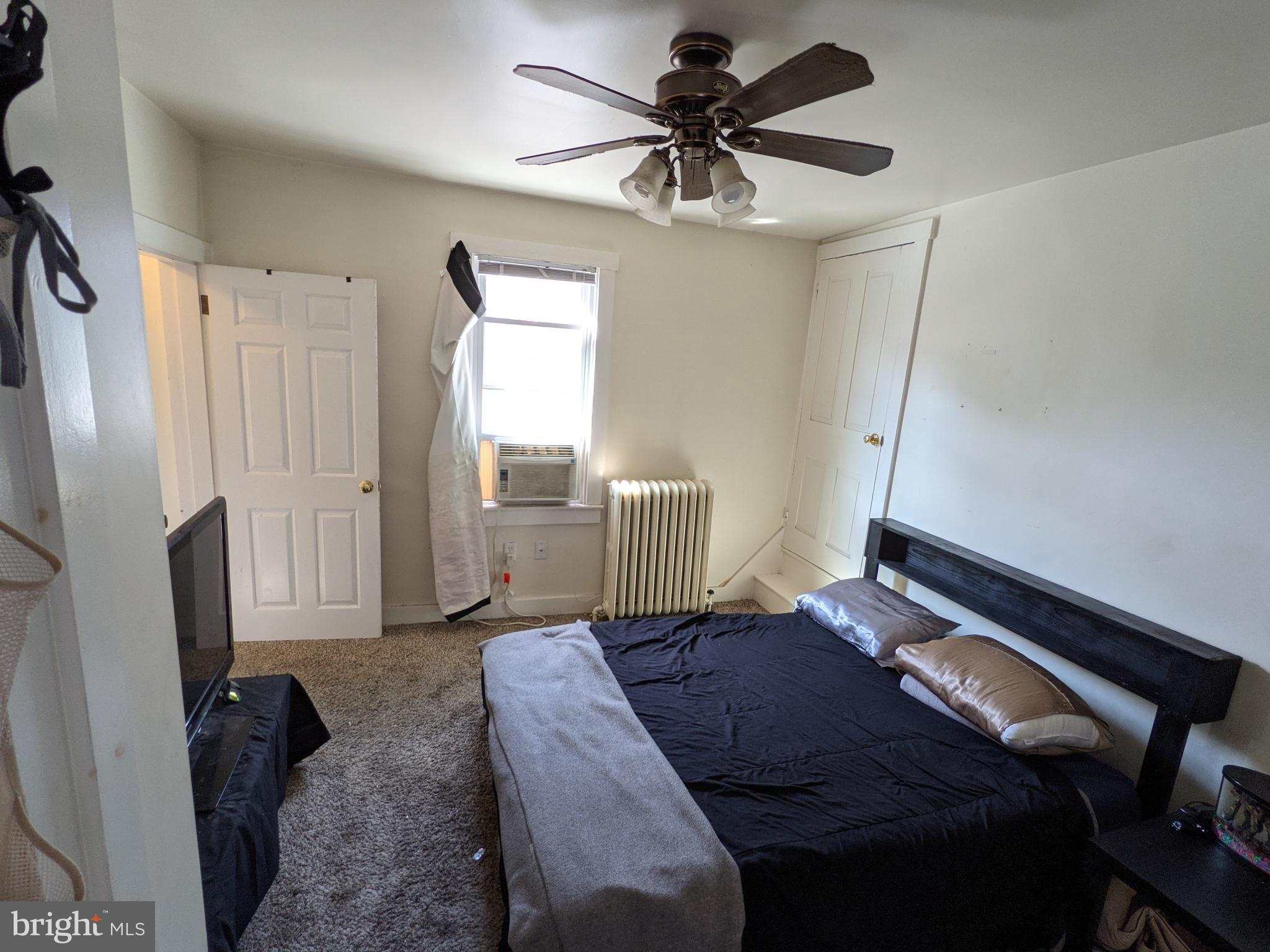 442 South Main Street, Unit A Manheim, PA 17545 - Photo 23 of 26 a living room with furniture and a flat screen tv