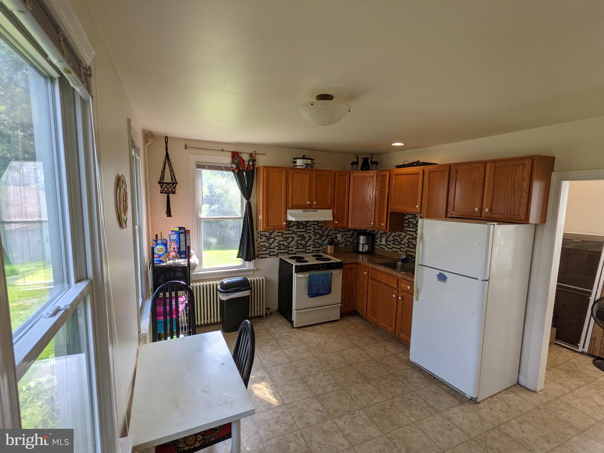 442 South Main Street, Unit A Manheim, PA 17545 - Photo 4 of 26 a kitchen with a refrigerator a stove and a sink