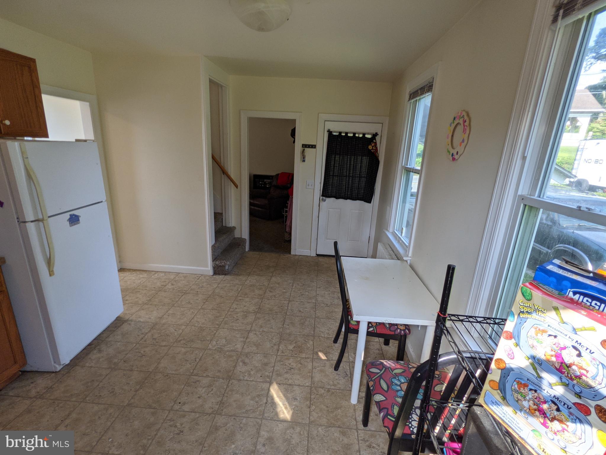 442 South Main Street, Unit A Manheim, PA 17545 - Photo 7 of 26 a living room with furniture and a flat screen tv