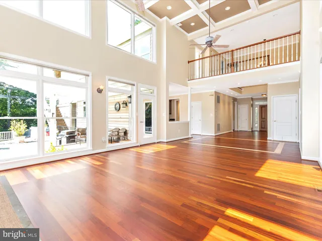 a view of a living room and kitchen view