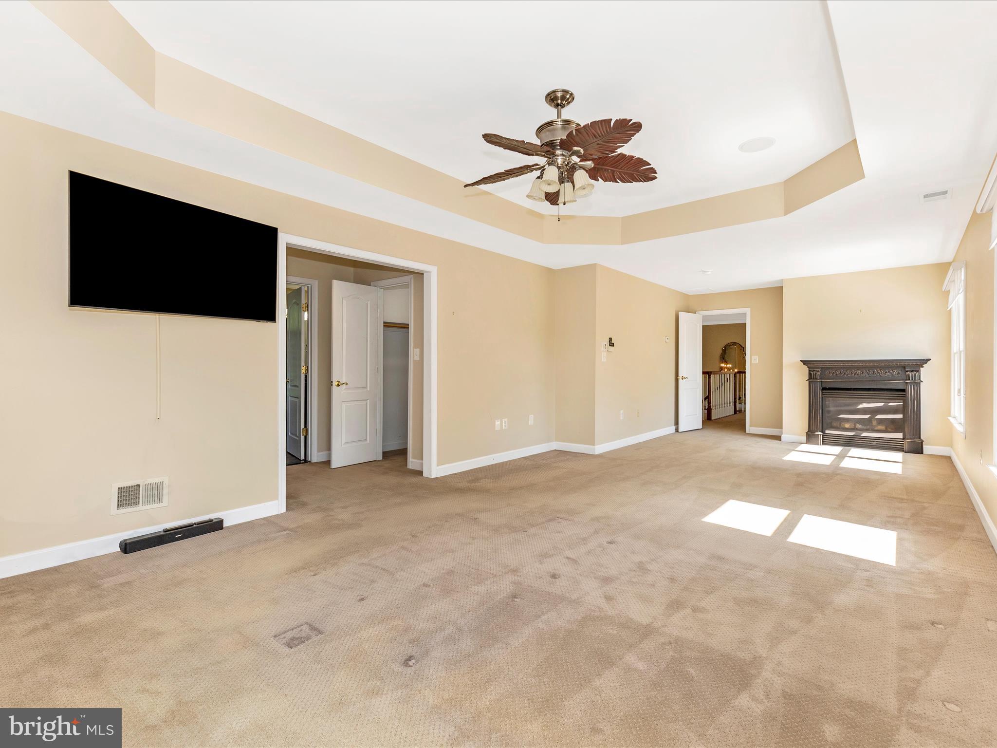 2305 Mt Ephraim Road Adamstown, MD 21710 - Photo 34 of 87 a view of a livingroom with a ceiling fan window and a ceiling fan