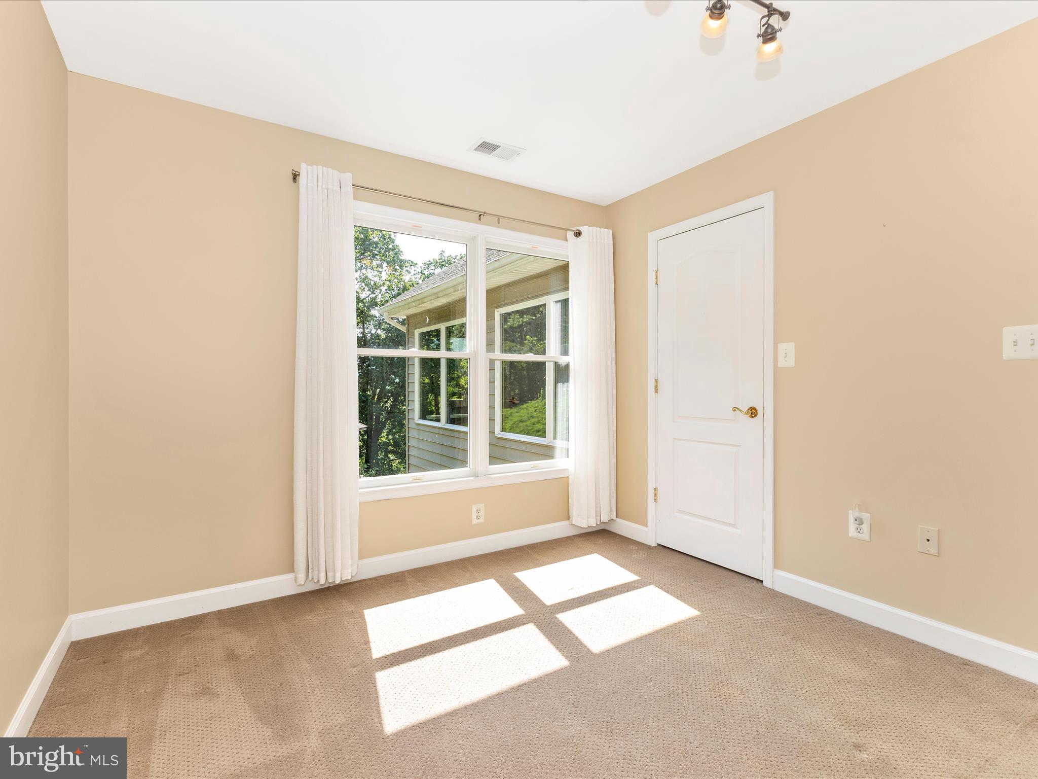 2305 Mt Ephraim Road Adamstown, MD 21710 - Photo 44 of 87 a view of an empty room with a window