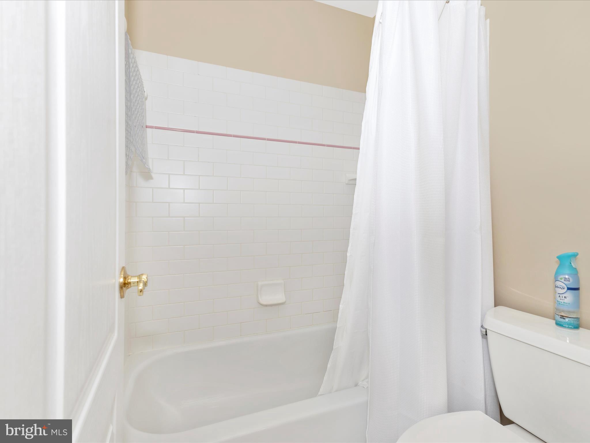 2305 Mt Ephraim Road Adamstown, MD 21710 - Photo 46 of 87 a white bath tub sitting next to a white toilet