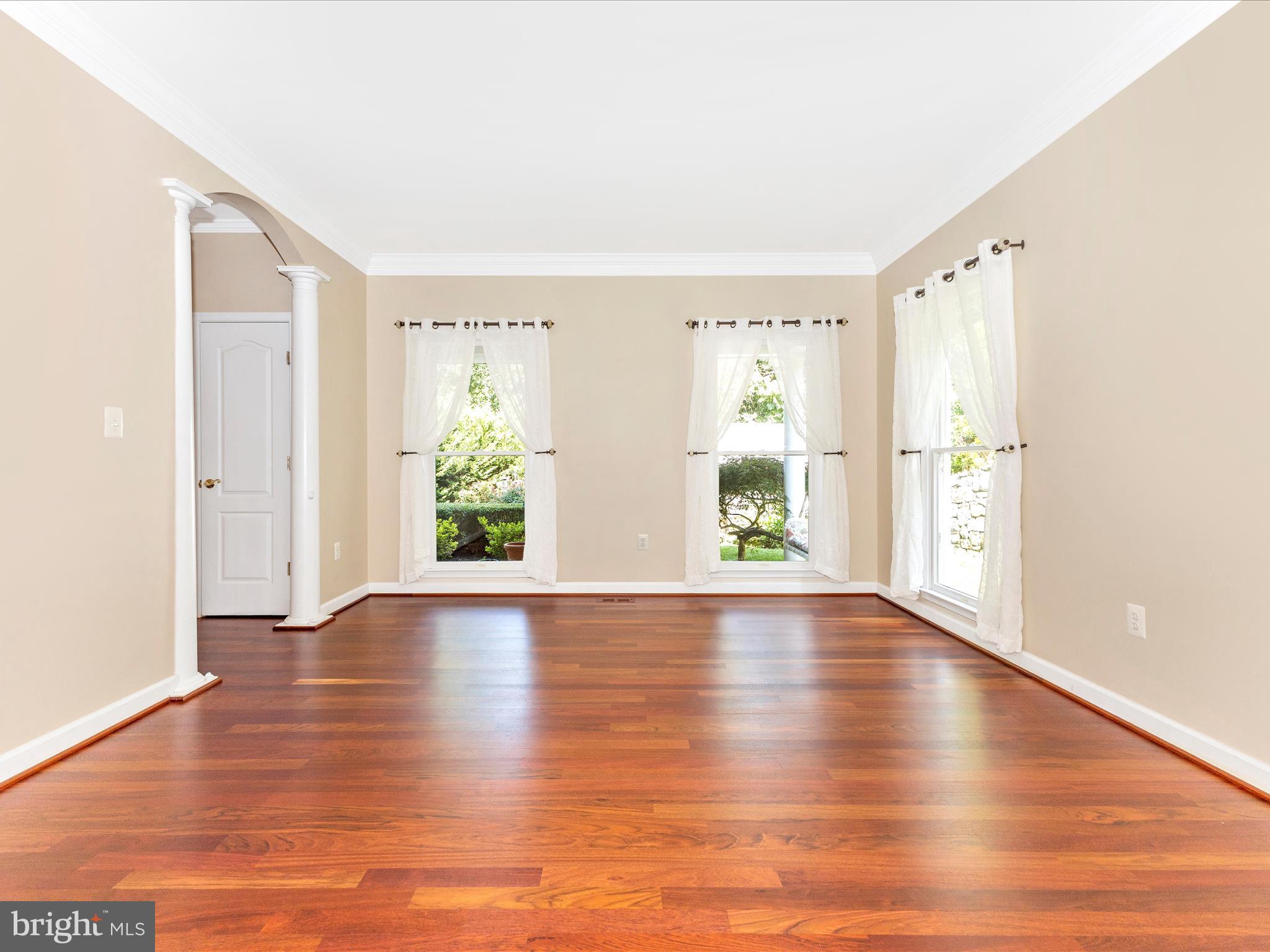 2305 Mt Ephraim Road Adamstown, MD 21710 - Photo 5 of 87 a view of an empty room with wooden floor and a window