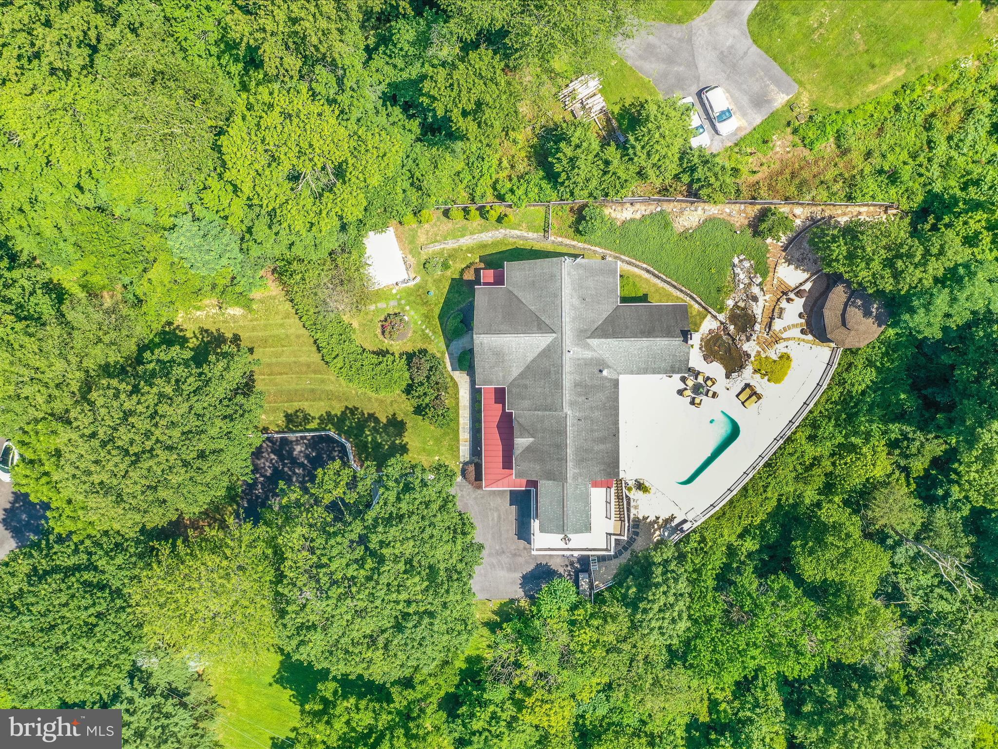 2305 Mt Ephraim Road Adamstown, MD 21710 - Photo 73 of 87 an aerial view of a house with a yard and large trees