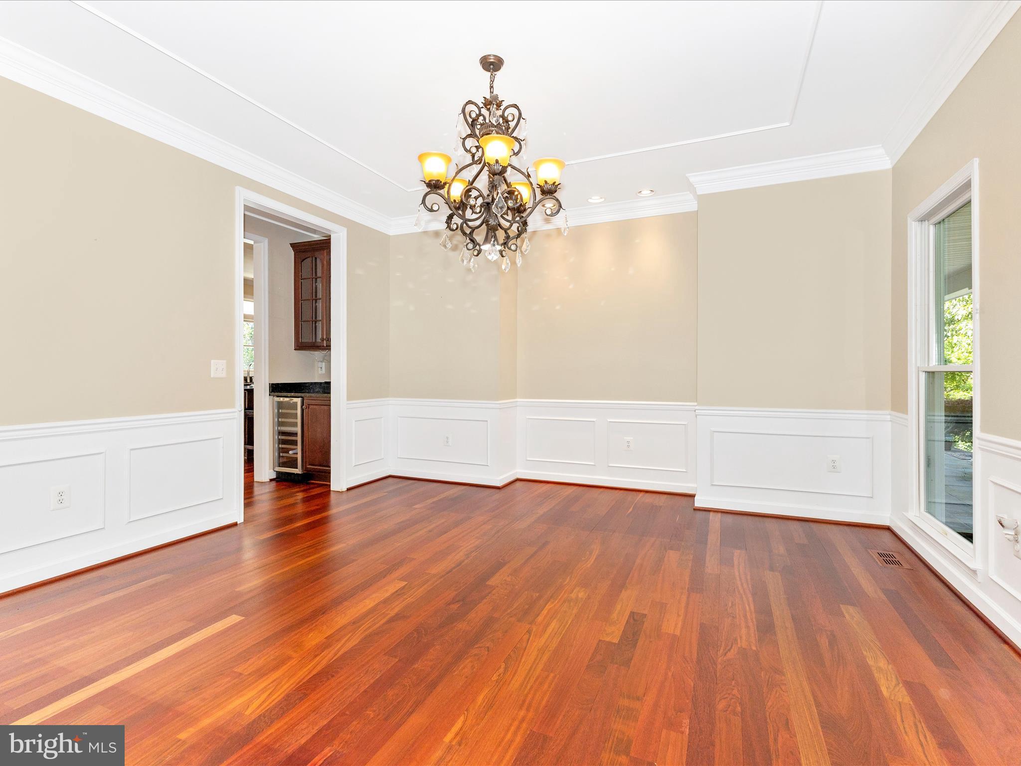 2305 Mt Ephraim Road Adamstown, MD 21710 - Photo 9 of 87 a view of an empty room with wooden floor and a window