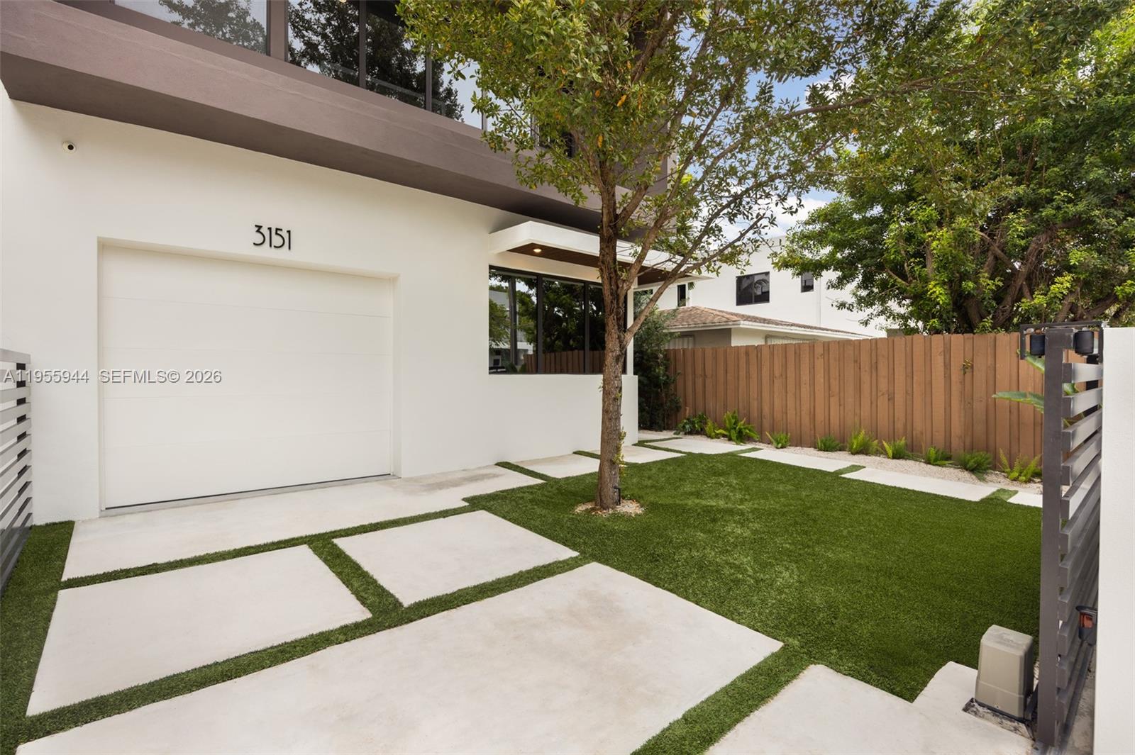3151 Hibiscus Street, Unit 3151 Miami, FL 33133 - Photo 2 of 47 a view of backyard with green space
