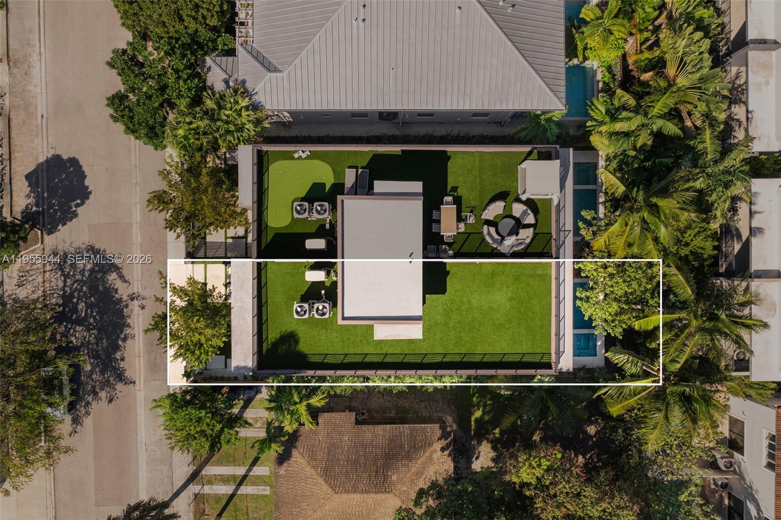 3151 Hibiscus Street, Unit 3151 Miami, FL 33133 - Photo 39 of 47 an aerial view of a house with a yard basket ball court and outdoor seating
