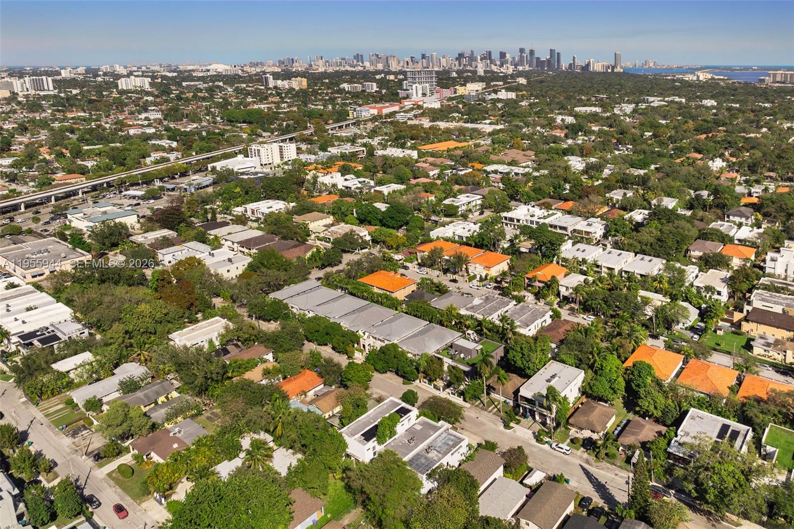 3151 Hibiscus Street, Unit 3151 Miami, FL 33133 - Photo 42 of 47 an aerial view of residential houses with city view