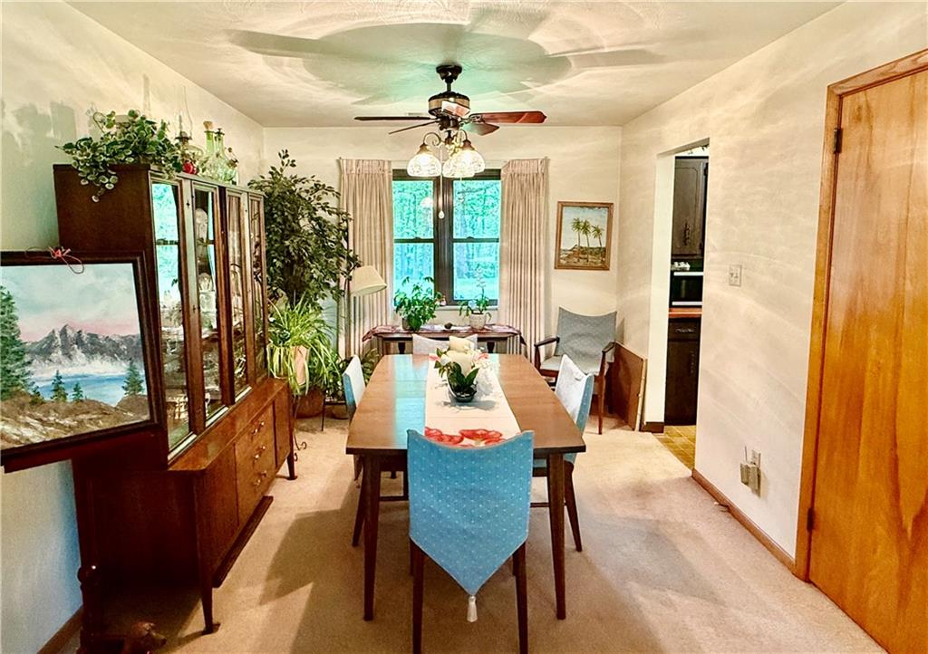 320 Saxonburg Road Butler, PA 16002 - Photo 17 of 36 a view of a dining room with furniture window and wooden floor