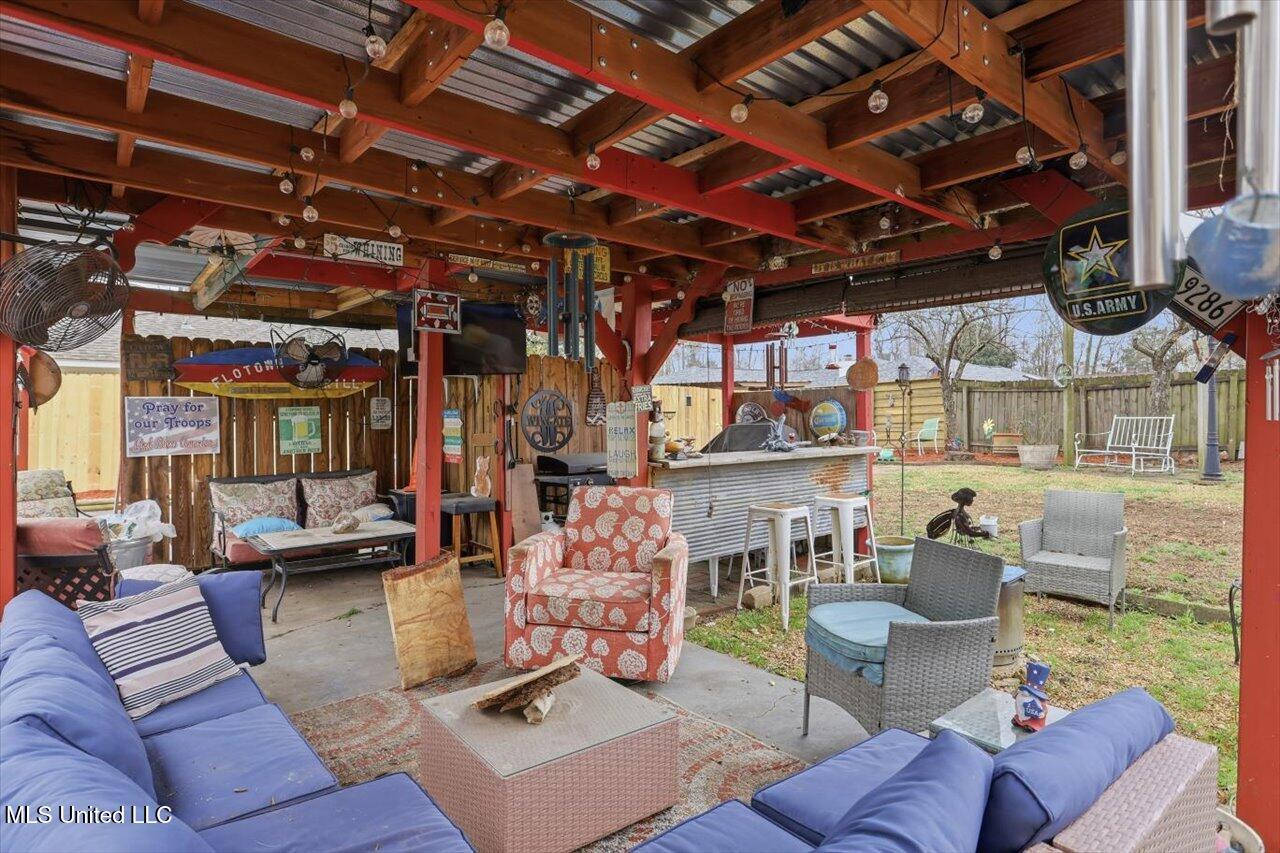 229 Greenfield Place Brandon, MS 39047 - Photo 29 of 38 Covered Back Porch Sitting Area
