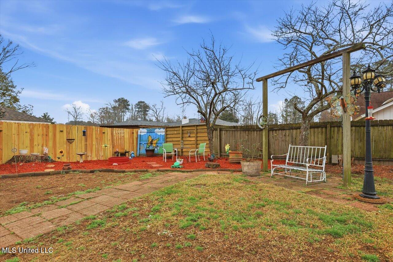 229 Greenfield Place Brandon, MS 39047 - Photo 33 of 38 Back yard garden