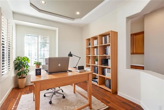 a workspace with furniture and window