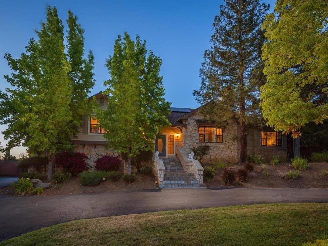 105 Alerche Drive Los Gatos, CA 95032 - Photo 11 of 36 a front view of a house with garden