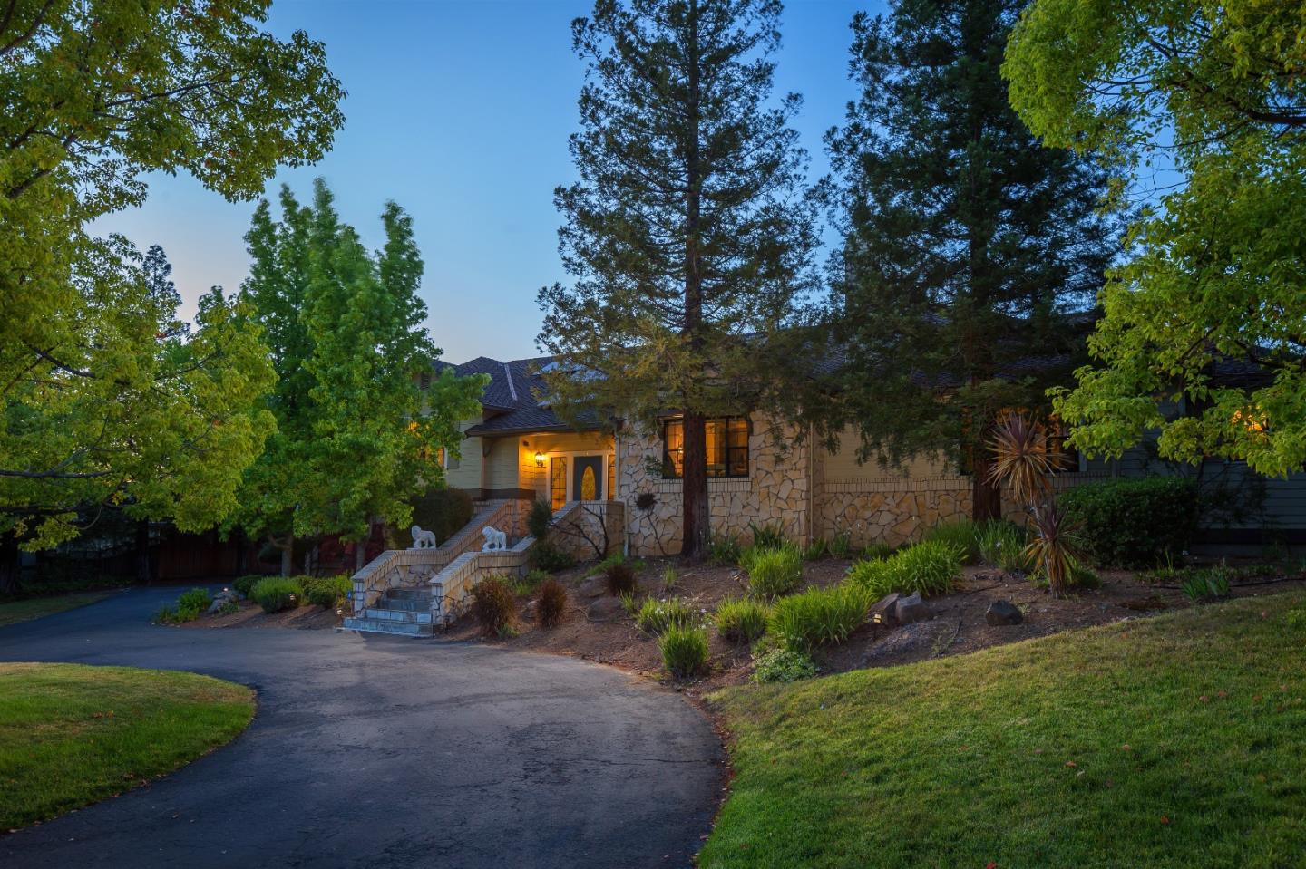 105 Alerche Drive Los Gatos, CA 95032 - Photo 13 of 36 a front view of a house with garden