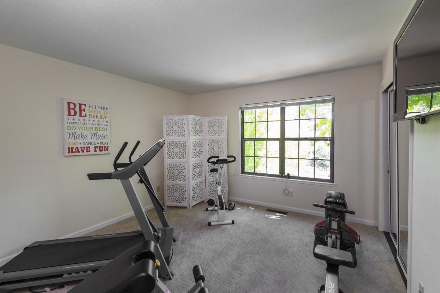 105 Alerche Drive Los Gatos, CA 95032 - Photo 27 of 36 a view of a room with gym equipment