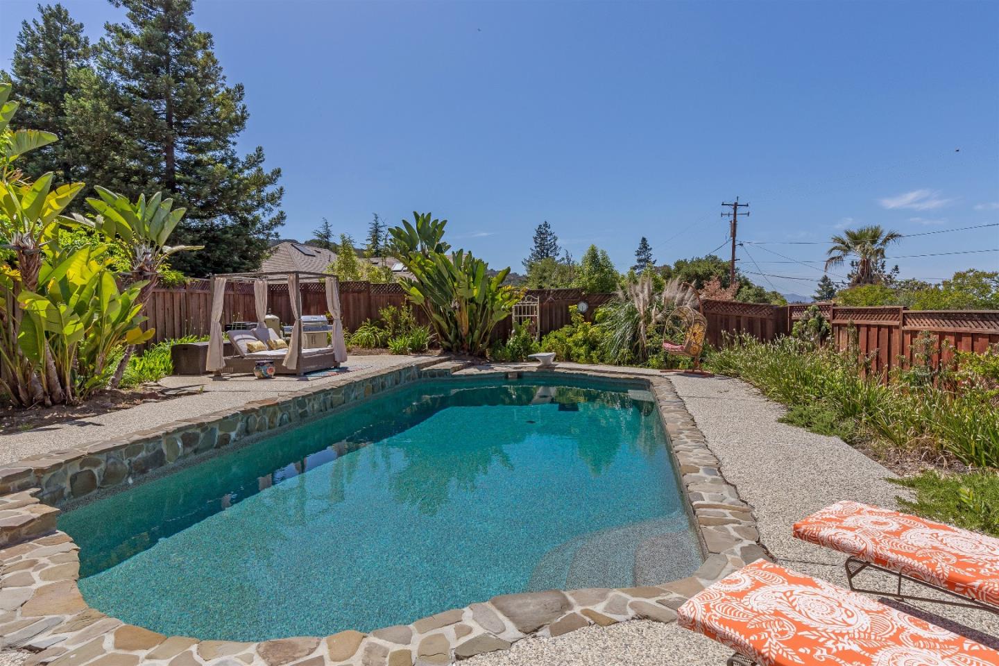 105 Alerche Drive Los Gatos, CA 95032 - Photo 32 of 36 a view of a swimming pool with a yard