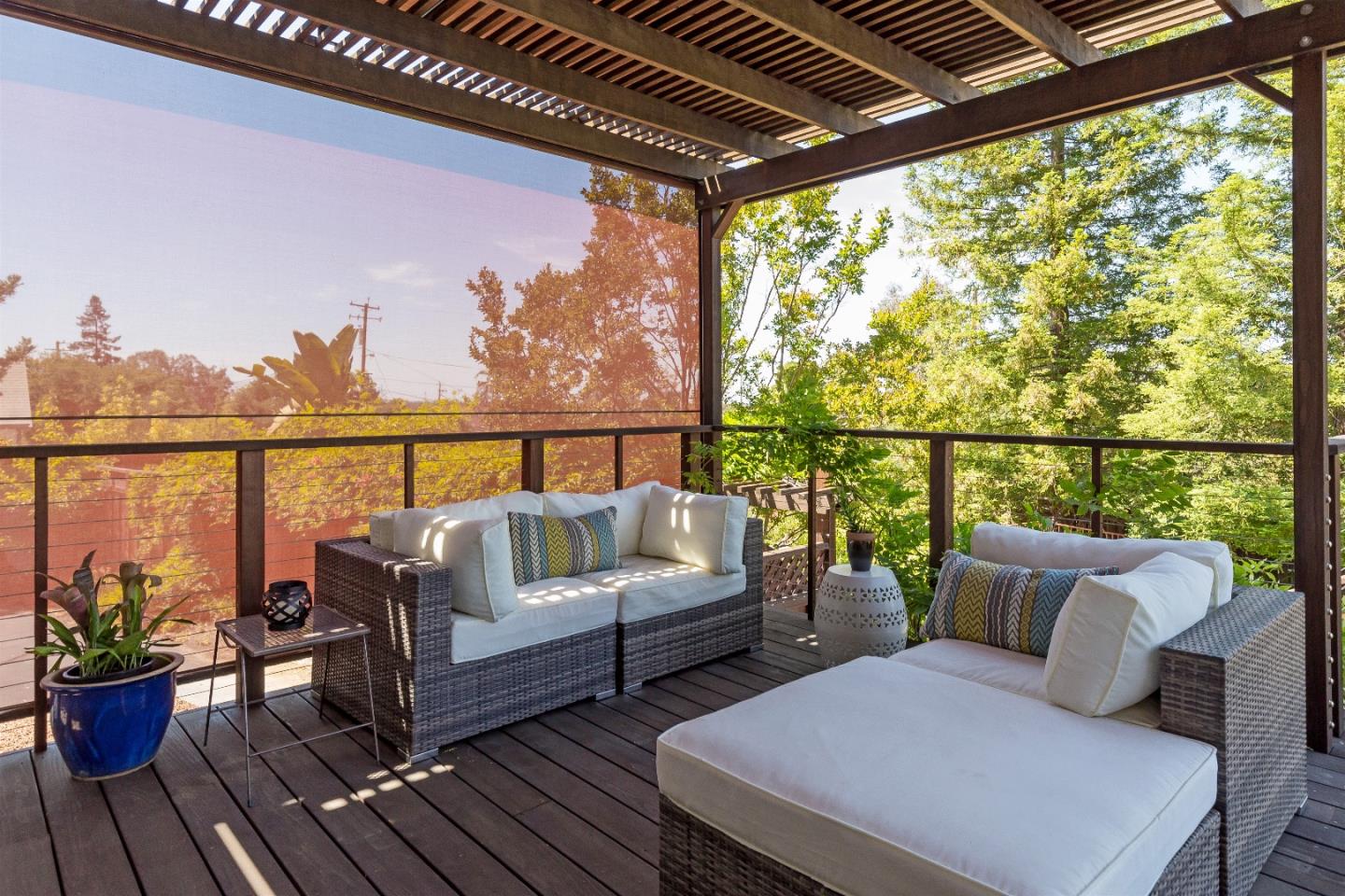105 Alerche Drive Los Gatos, CA 95032 - Photo 9 of 36 a balcony with furniture and wooden floor