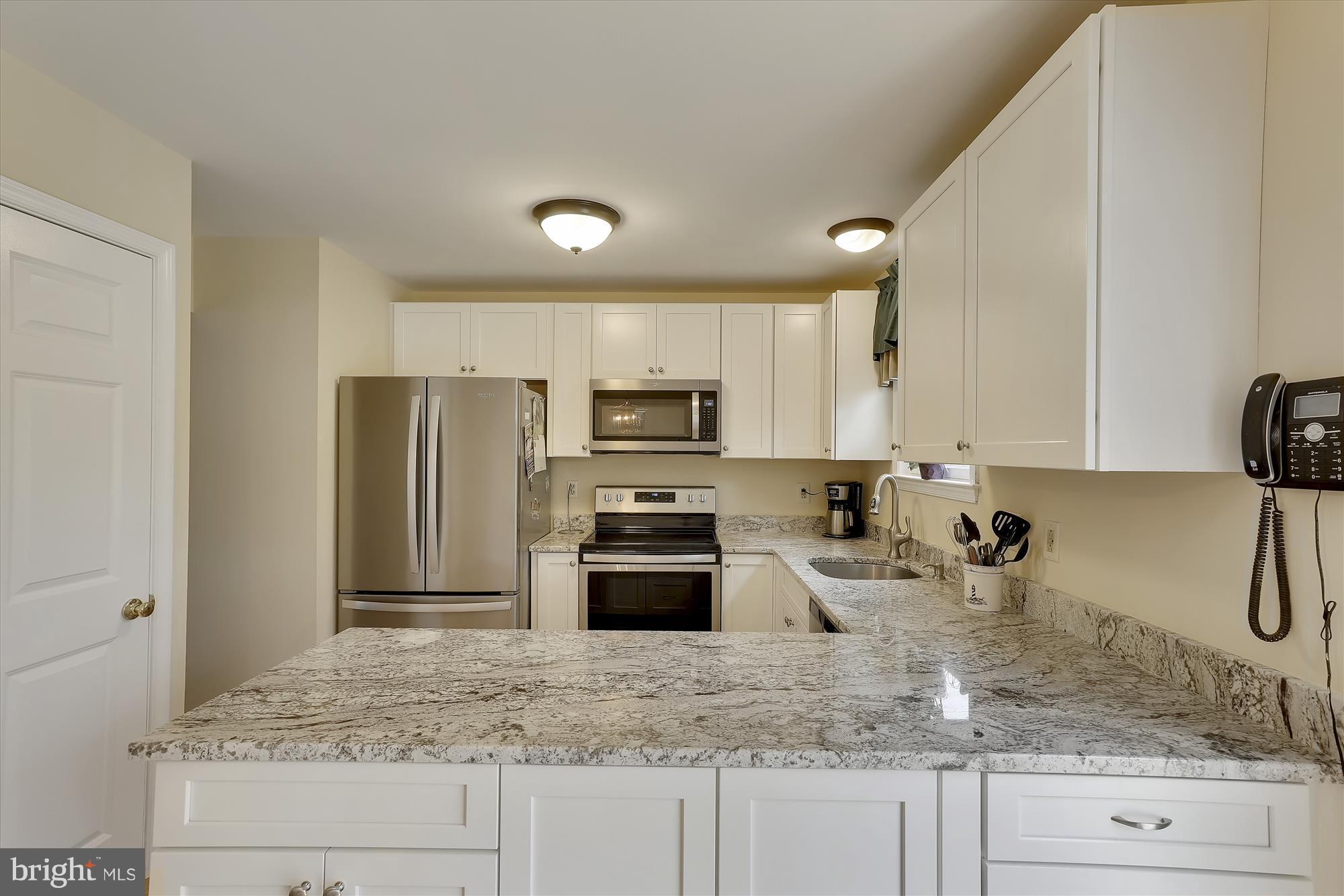 6 Manchester Road Pasadena, MD 21122 - Photo 7 of 30 New Kitchen w/granite counters & ss appliances