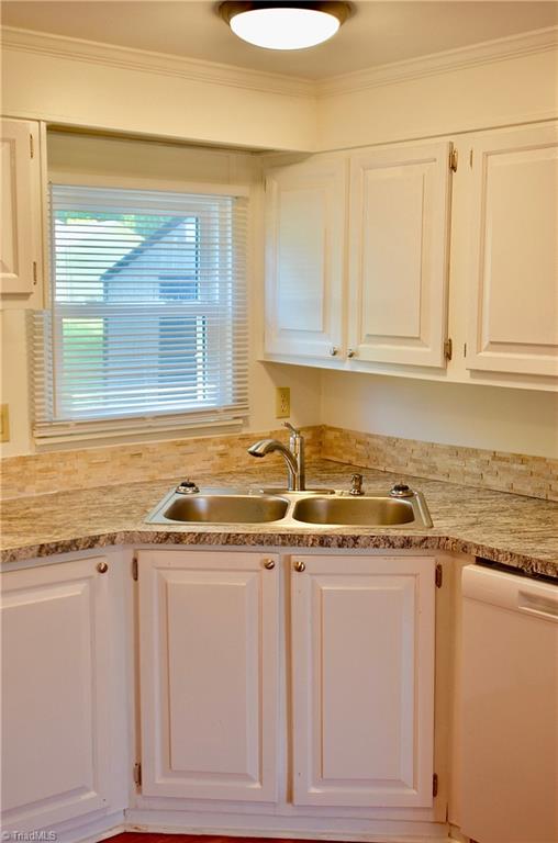 615 Cook Road Rural Hall, NC 27045 - Photo 17 of 47 Another view of kitchen sink and window to yard From DR doorway