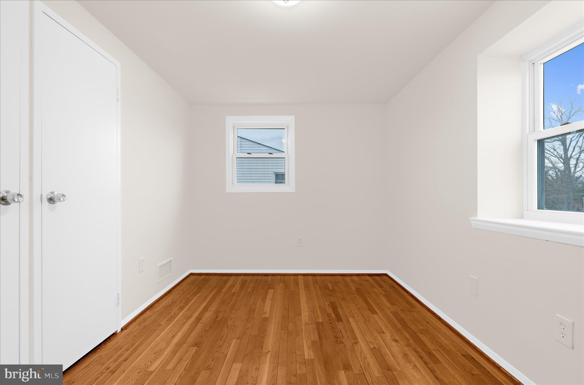 725 Kingston Road Baltimore, MD 21220 - Photo 21 of 55 a view of a room with wooden floor and a window
