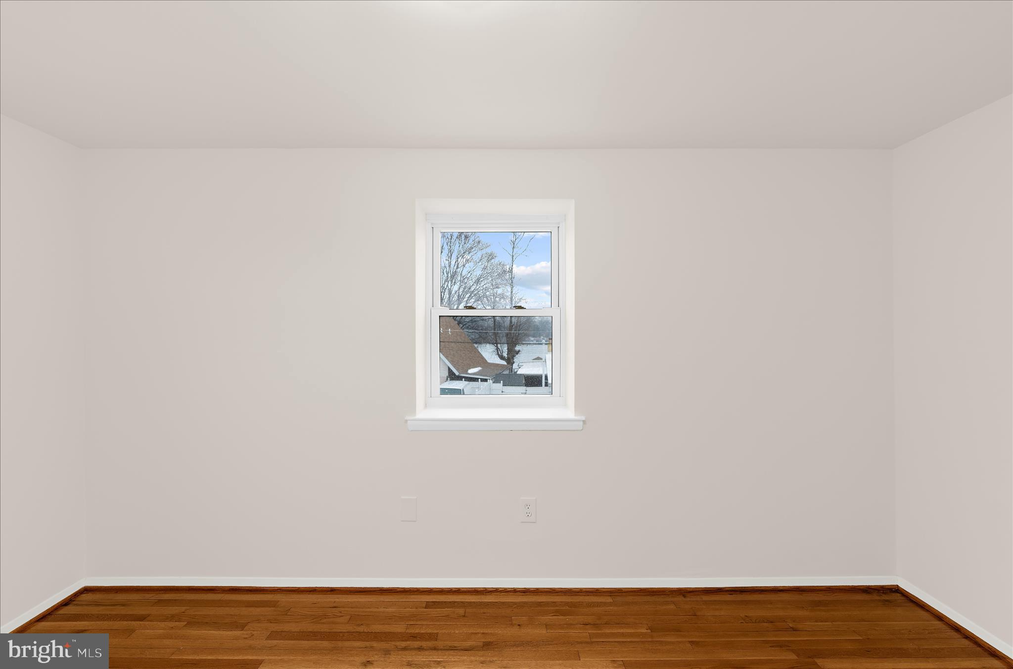 725 Kingston Road Baltimore, MD 21220 - Photo 22 of 55 a view of a room with wooden floor and fan