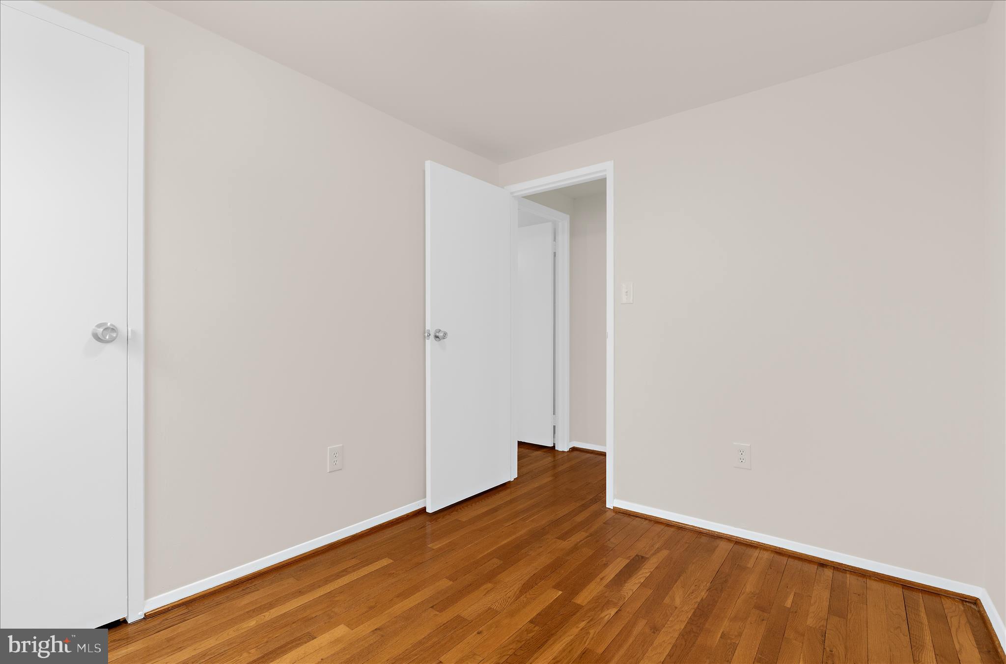 725 Kingston Road Baltimore, MD 21220 - Photo 24 of 55 a view of empty room with wooden floor