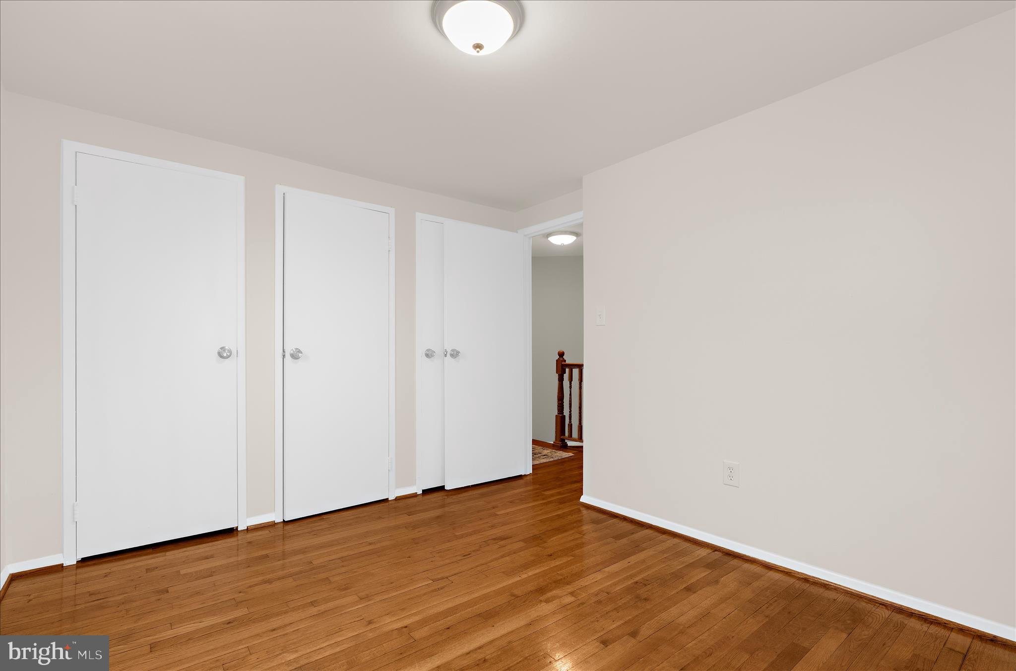 725 Kingston Road Baltimore, MD 21220 - Photo 26 of 55 a view of an empty room with wooden floor