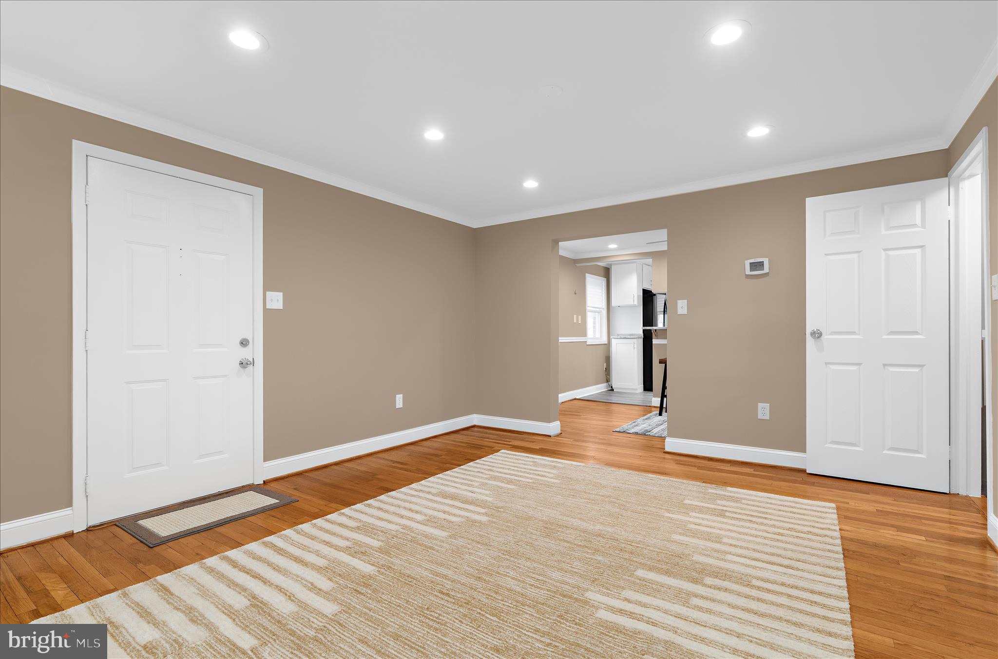 725 Kingston Road Baltimore, MD 21220 - Photo 9 of 55 a view of a livingroom with wooden floor