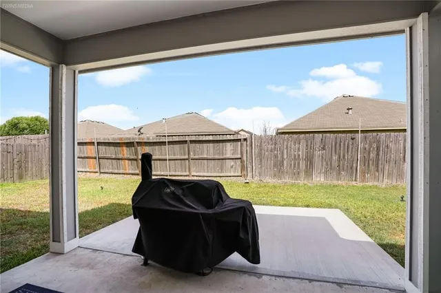 a house view with a garden space