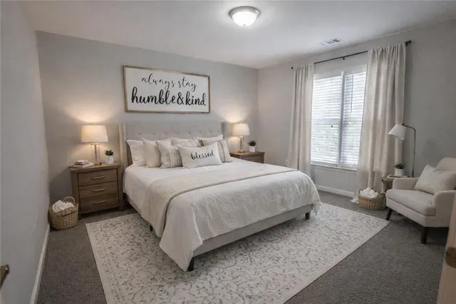 a spacious bathroom with a bathtub and a sink