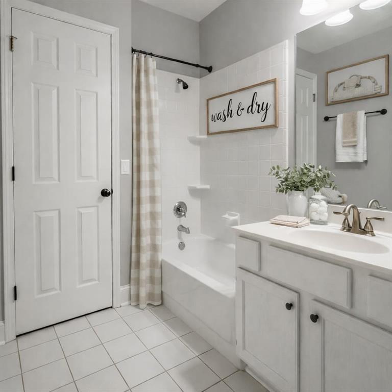 915 Bishops Crossing Norcross, GA 30071 - Photo 8 of 10 a spacious bathroom with a bathtub and a sink