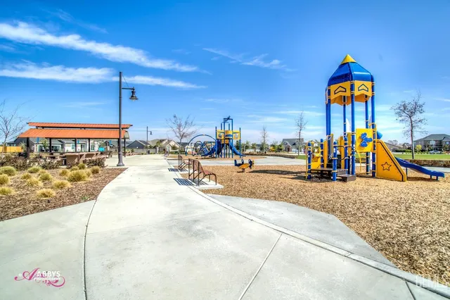 a view of a swimming pool with a bench