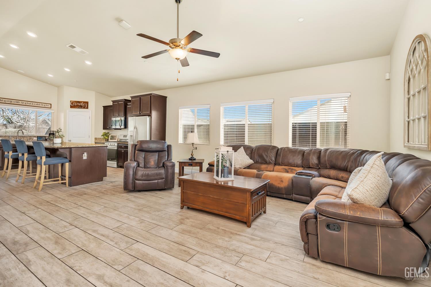 Undisclosed Address Shafter, CA 93263 - Photo 9 of 26 a living room with furniture kitchen view and a large window