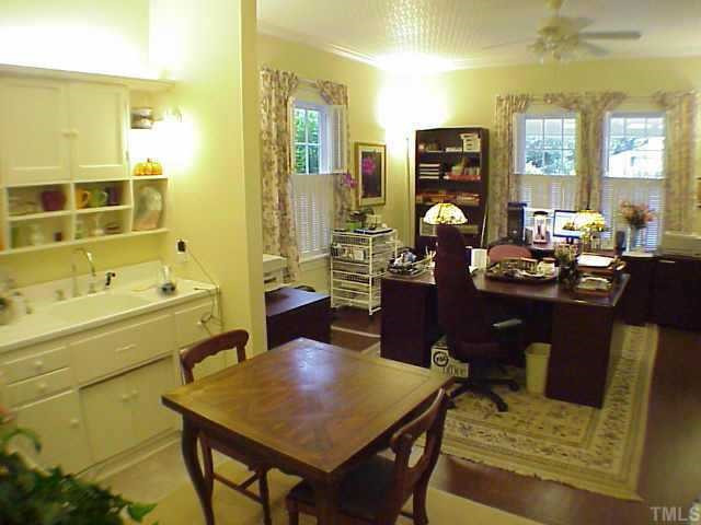 311 Cutler Street Raleigh, NC 27603 - Photo 7 of 10 The downstairs home office suite includes a 2nd kitchen and utility room. It could become a 2nd master suite. Other