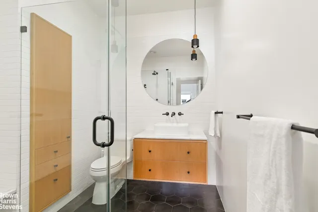 a room with a table and chairs