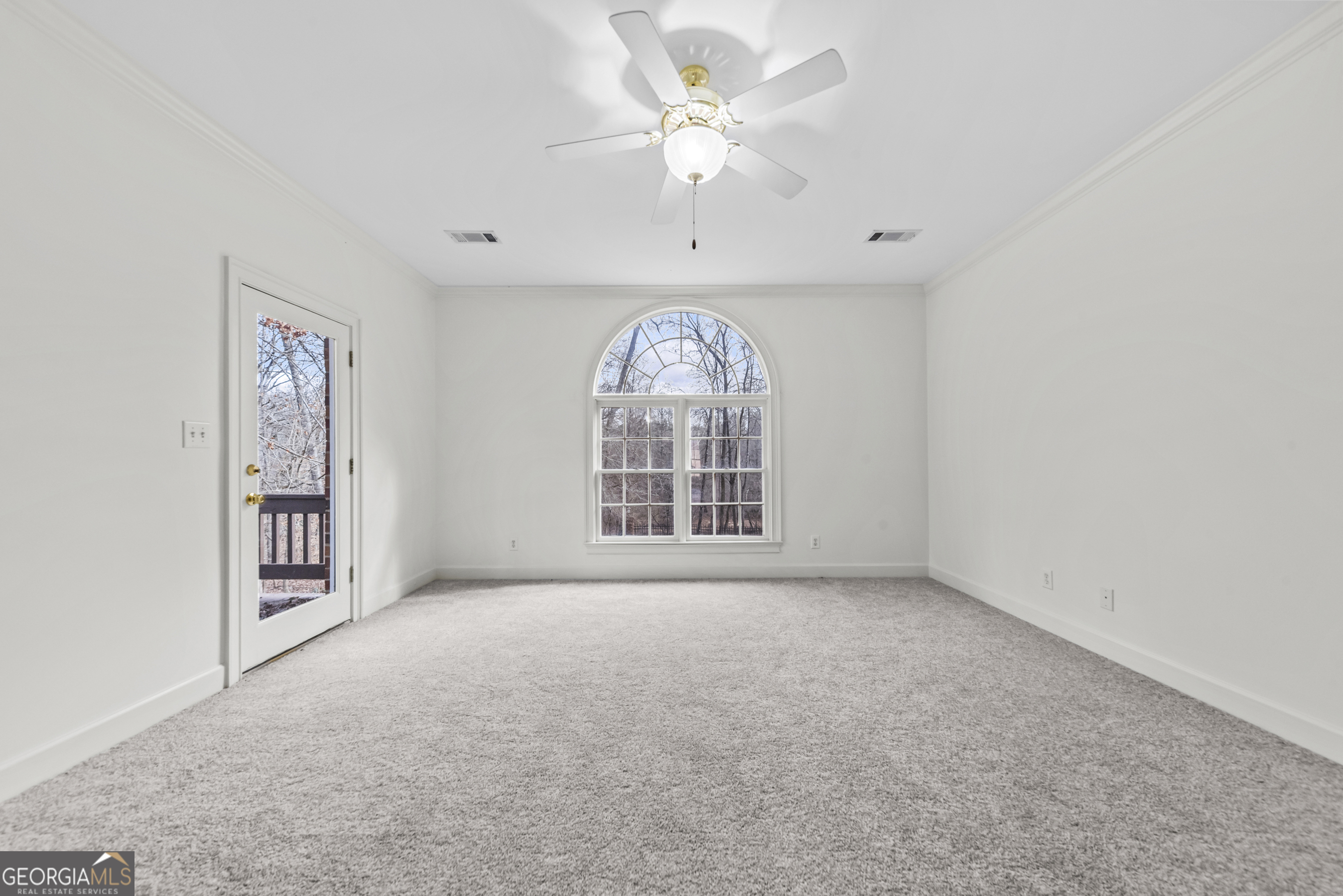 1171 River Run Bishop, GA 30621 - Photo 26 of 78 an empty room with windows and fan